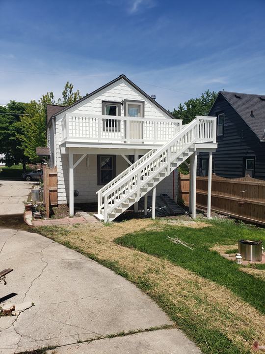 Carriage house: siding, deck, railings and stairs