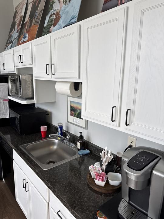 Office café cabinets painted bright white (commercial)